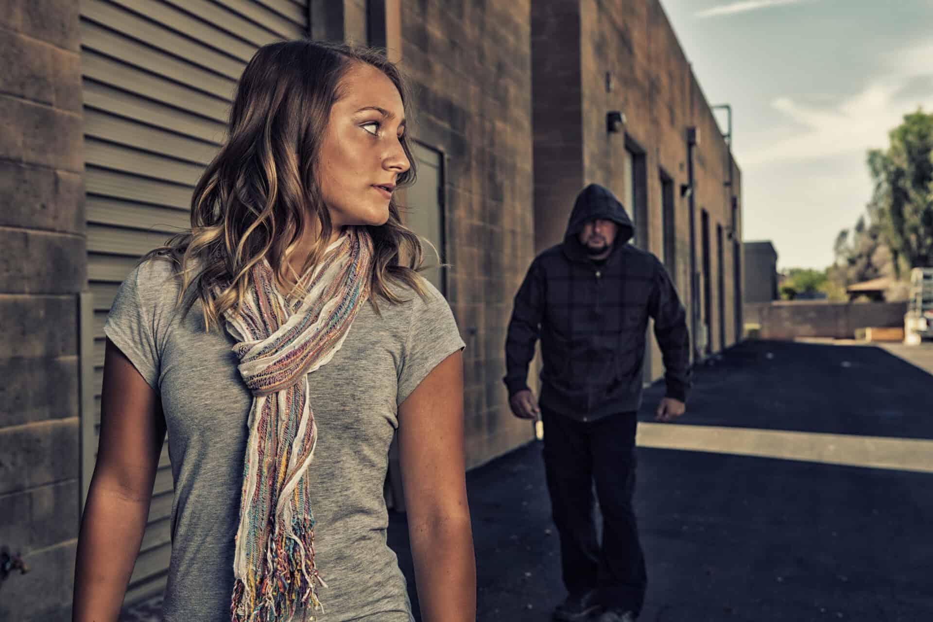 Girl who knows self defense sees a man walking behind her.